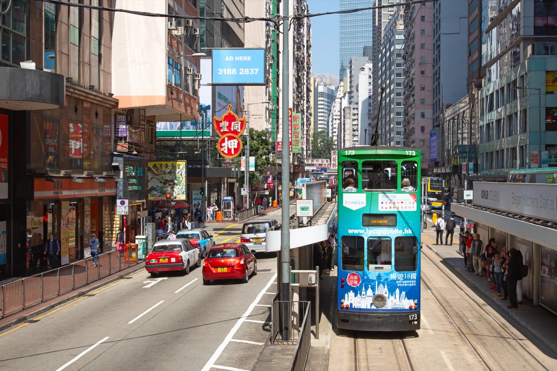 A double-decker tram on a Hong Kong street